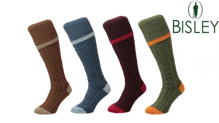 Bisley-Cable-Shooting-Socks-From-Left-To-Right,-Conker-Brown,-Denim-Blue,-Maroon-and-olive-green-with-the-bisley-logo-in-the-top-right-corner